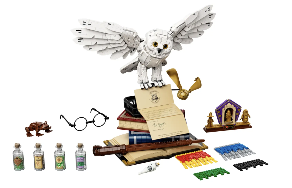 Hedwig the owl in lego with hogwarts letter, potions bottles, glasses and chocolate frog card picture